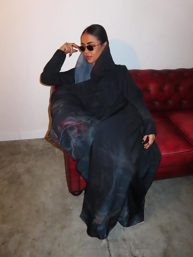 Dark Abaya with Abstract Hem Print