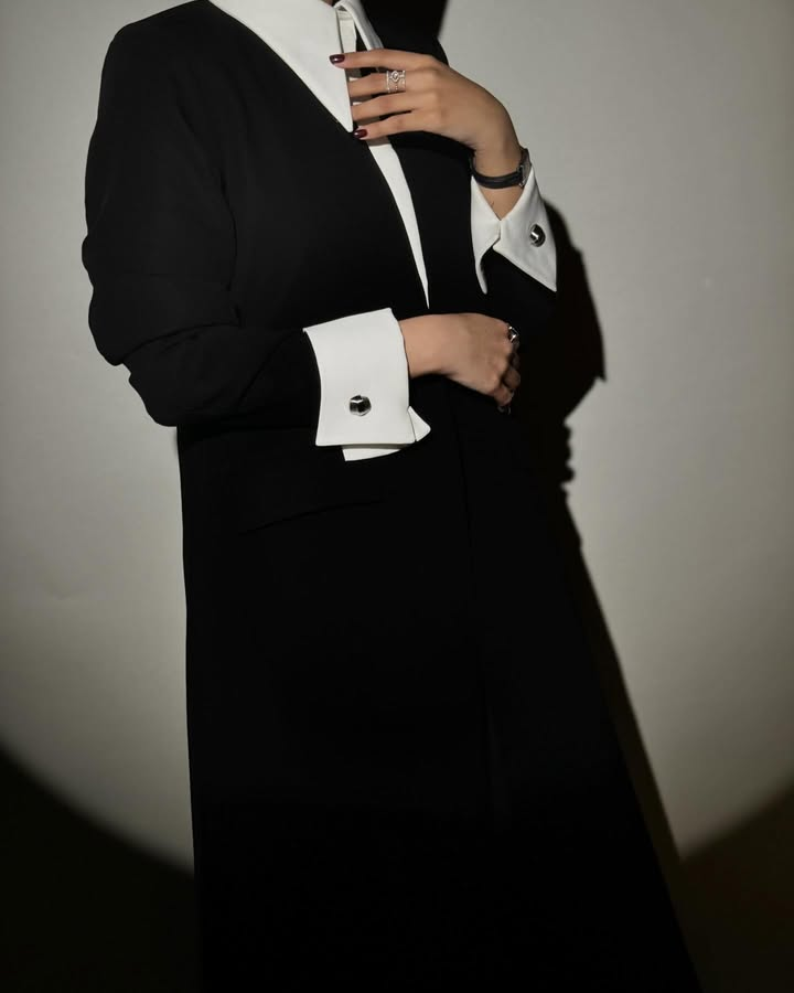 Black Tailored Coat with Exaggerated White Cuffs